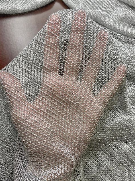 fake chainmail cloth - material that looks like chainmail.